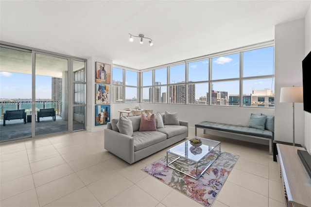 3301 NE 1st Ave Unit H2412, Miami, FL 33137 - living room featuring healthy amount of natural light, light tile patterned floors, and a city view