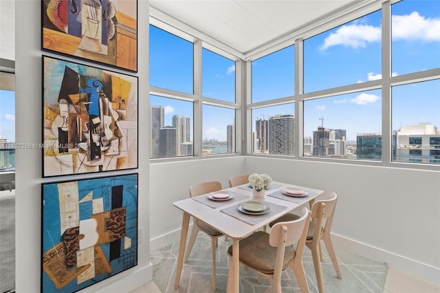 3301 NE 1st Ave Unit H2412, Miami, FL 33137 - dining room featuring baseboards and a view of skyline
