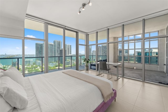 3301 NE 1st Ave Unit H2412, Miami, FL 33137 - tiled bedroom with a wall of windows and a view of city