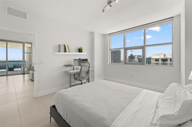 3301 NE 1st Ave Unit H2412, Miami, FL 33137 - bedroom with tile patterned floors and a desk