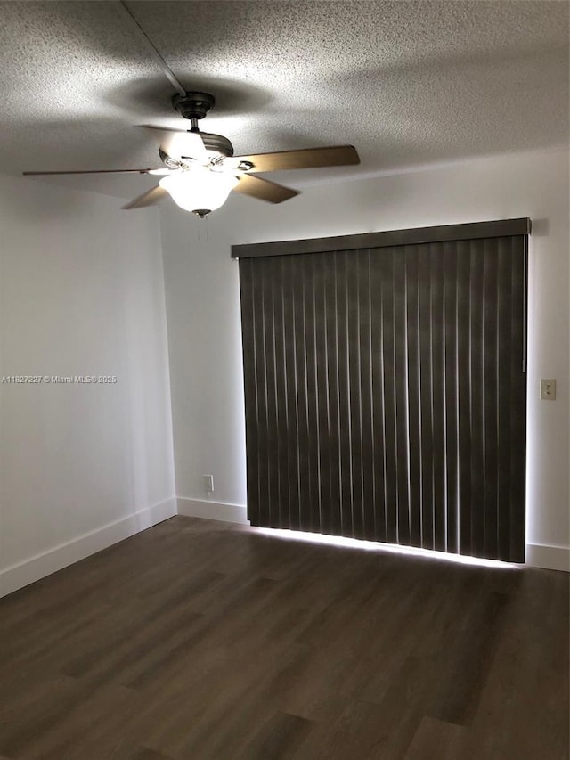 850 SW 133rd Ter Unit 302B, Pembroke Pines, FL 33027 - spare room featuring ceiling fan, wood finished floors, and a textured ceiling