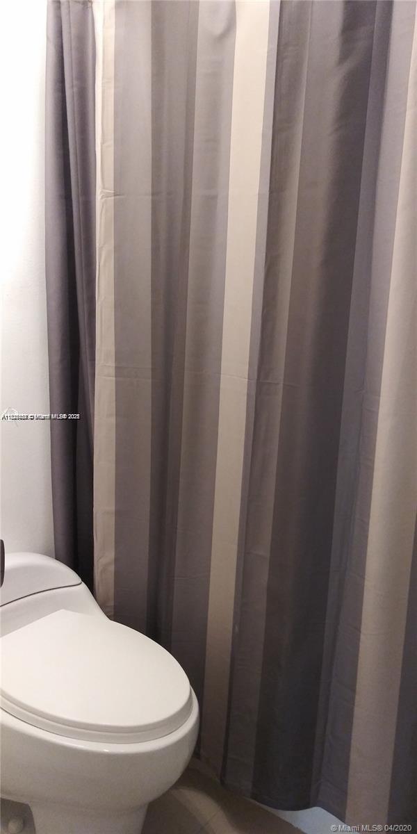 1235 Mariposa Ave Unit 8, Coral Gables, FL 33146 - bathroom with toilet