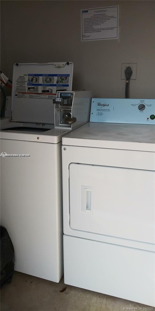 1235 Mariposa Ave Unit 8, Coral Gables, FL 33146 - washroom featuring washing machine and dryer