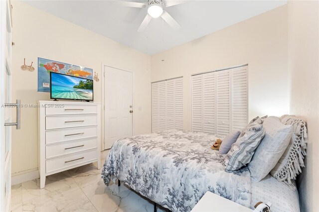 371 NE 32nd Ter, Homestead, FL 33033 - bedroom featuring light marble finish floors, ceiling fan, and a closet