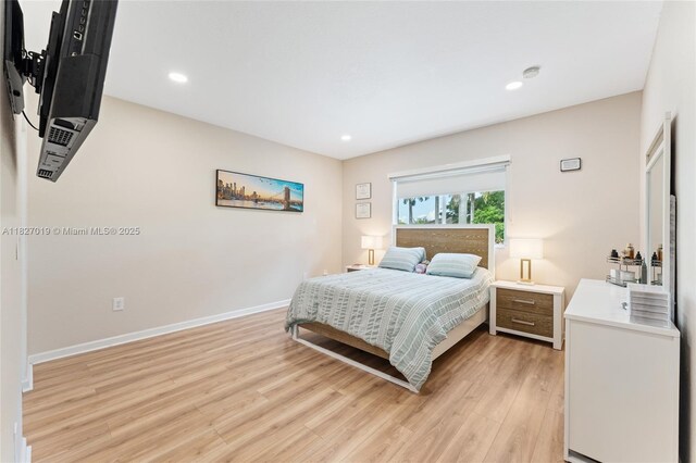 371 NE 32nd Ter, Homestead, FL 33033 - bedroom with light wood-style flooring and recessed lighting