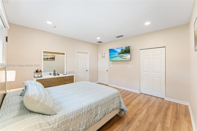 371 NE 32nd Ter, Homestead, FL 33033 - bedroom with light wood-type flooring and recessed lighting