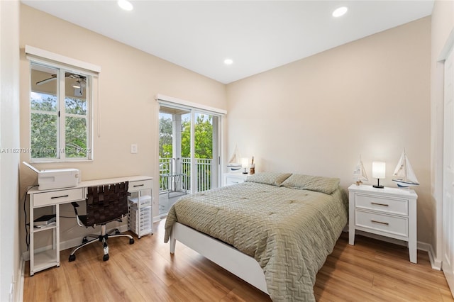 371 NE 32nd Ter, Homestead, FL 33033 - bedroom featuring access to outside, light wood-style floors, recessed lighting, and a desk