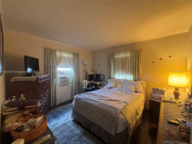 981 E 18th St, Hialeah, FL 33013 - bedroom featuring cooling unit and wood finished floors