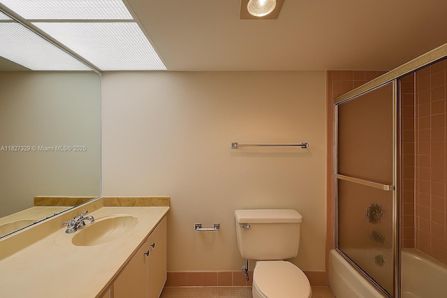 251 174th St Unit 115, Sunny Isles Beach, FL 33160 - bathroom featuring vanity, combined bath / shower with glass door, and tile patterned flooring