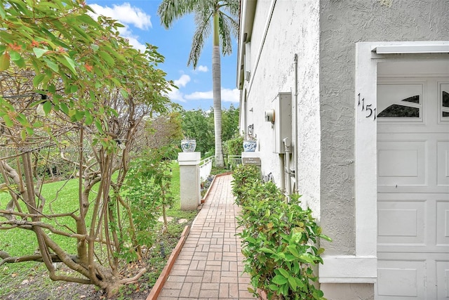 1151 W Lake St, Hollywood, FL 33019 - view of side of home with stucco siding