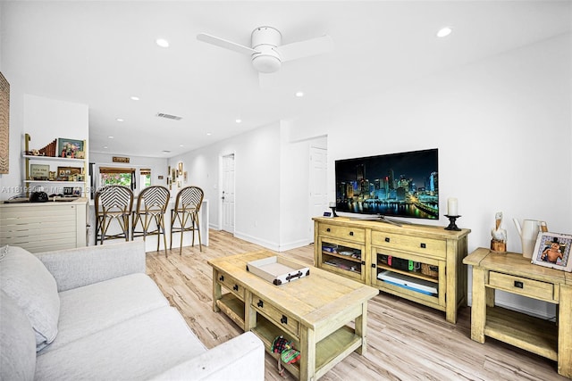 1151 W Lake St, Hollywood, FL 33019 - living room featuring light wood finished floors, recessed lighting, and a ceiling fan