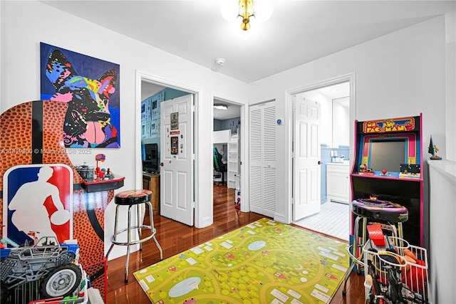 1151 W Lake St, Hollywood, FL 33019 - rec room featuring wood finished floors