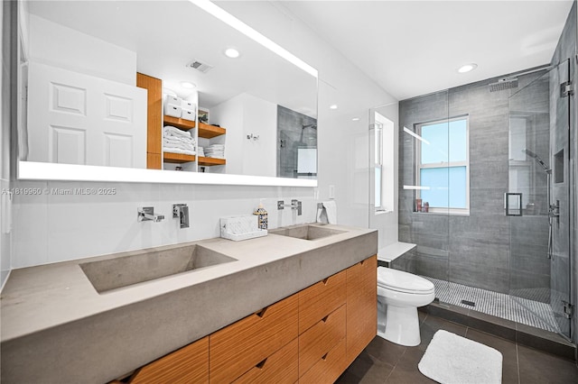 1151 W Lake St, Hollywood, FL 33019 - bathroom featuring double vanity, a shower stall, tile patterned flooring, and recessed lighting