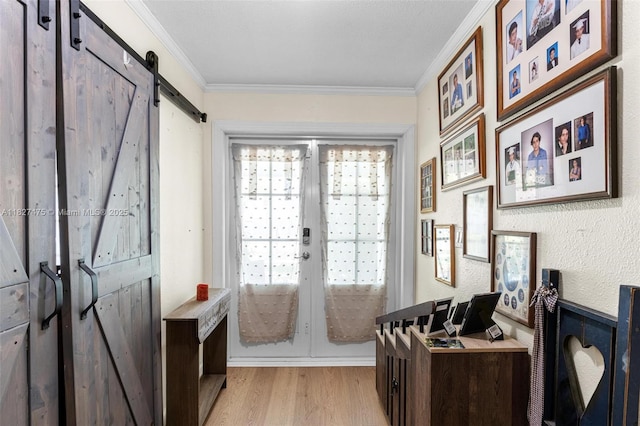 1360 S Audubon Dr, Homestead, FL 33035 - office with a barn door, light wood-style flooring, and ornamental molding