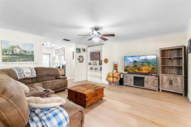 1360 S Audubon Dr, Homestead, FL 33035 - living area featuring light wood finished floors, crown molding, and ceiling fan