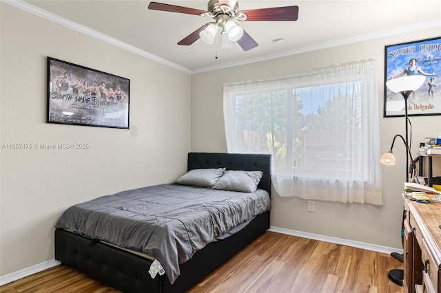 1360 S Audubon Dr, Homestead, FL 33035 - bedroom featuring wood finished floors, ornamental molding, and a ceiling fan