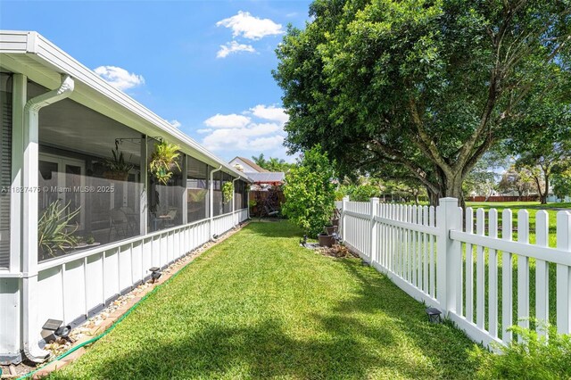 1360 S Audubon Dr, Homestead, FL 33035 - fenced backyard with a sunroom