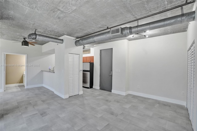 455 NE 25th St Unit 609, Miami, FL 33137 - basement featuring freestanding refrigerator and a ceiling fan