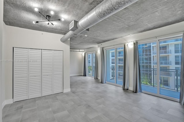 455 NE 25th St Unit 609, Miami, FL 33137 - spare room featuring healthy amount of natural light and wood finished floors