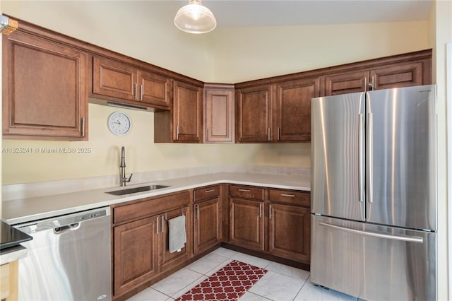 5595 Eagle Way, Merritt Island, FL 32953 - kitchen with appliances with stainless steel finishes, light countertops, and light tile patterned floors