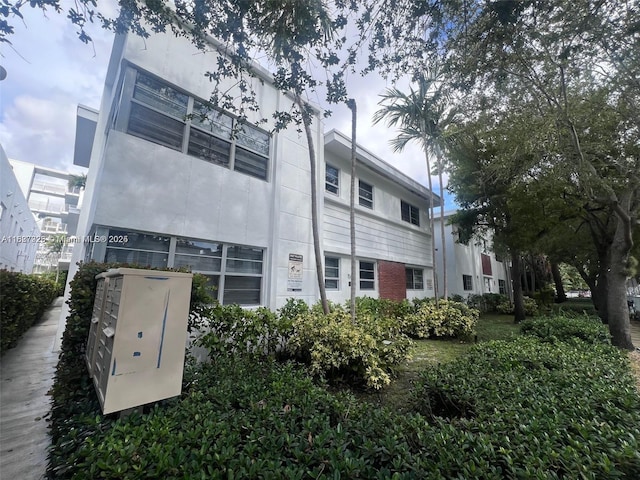 1550 Pennsylvania Ave Unit 126, Miami Beach, FL 33139 - rear view of house with stucco siding
