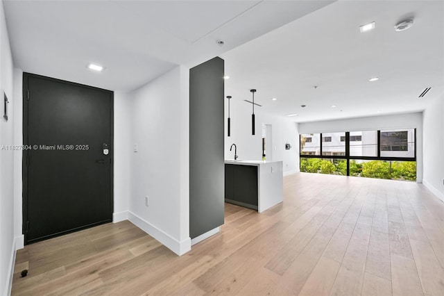 200 Sunrise Dr Unit 200C, Key Biscayne, FL 33149 - spare room with light wood-style flooring, a smoke detector, and recessed lighting