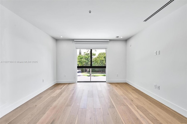 200 Sunrise Dr Unit 200C, Key Biscayne, FL 33149 - spare room with light wood finished floors and baseboards
