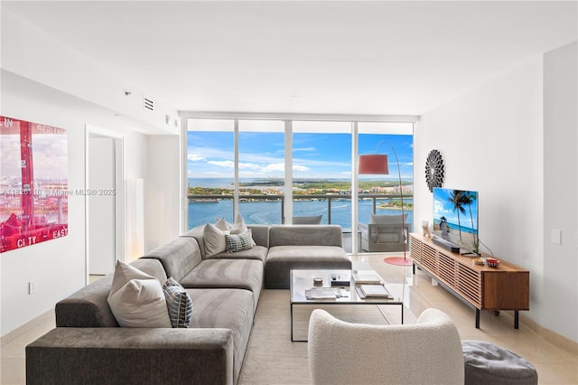 450 Alton Rd Unit 2705, Miami Beach, FL 33139 - living area with plenty of natural light and a wall of windows
