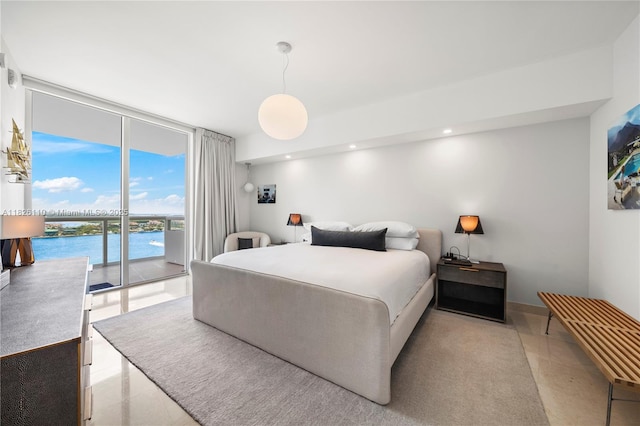 450 Alton Rd Unit 2705, Miami Beach, FL 33139 - bedroom with a wall of windows, access to outside, and recessed lighting