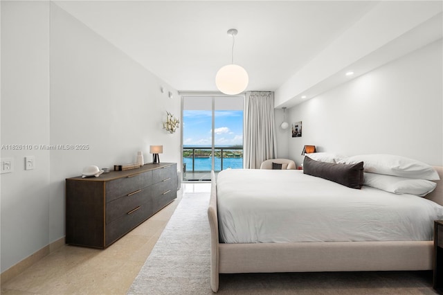 450 Alton Rd Unit 2705, Miami Beach, FL 33139 - bedroom featuring access to exterior, expansive windows, and a water view