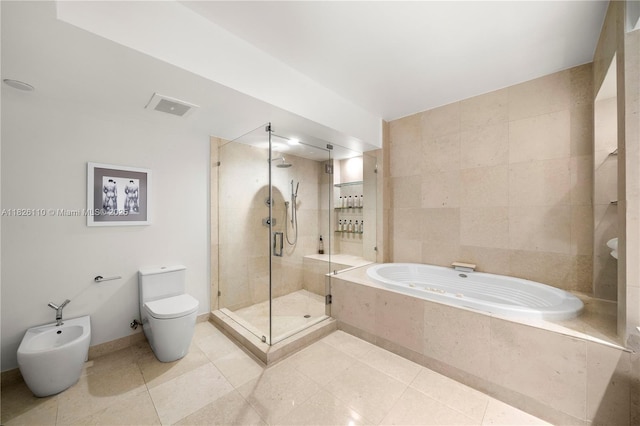 450 Alton Rd Unit 2705, Miami Beach, FL 33139 - bathroom with a stall shower, a jetted tub, a bidet, and tile patterned floors