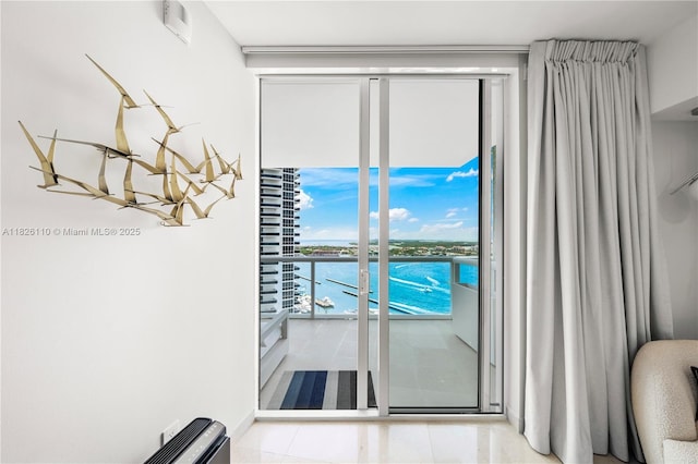 450 Alton Rd Unit 2705, Miami Beach, FL 33139 - doorway to outside with a water view and a chandelier