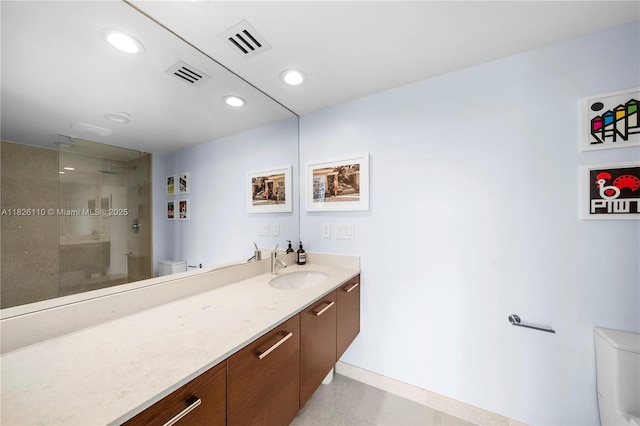 450 Alton Rd Unit 2705, Miami Beach, FL 33139 - bathroom with vanity, tiled shower, and recessed lighting