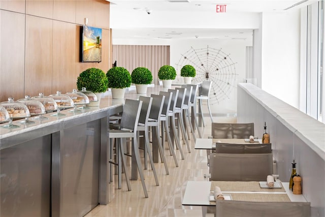 450 Alton Rd Unit 2705, Miami Beach, FL 33139 - bar featuring light tile patterned floors