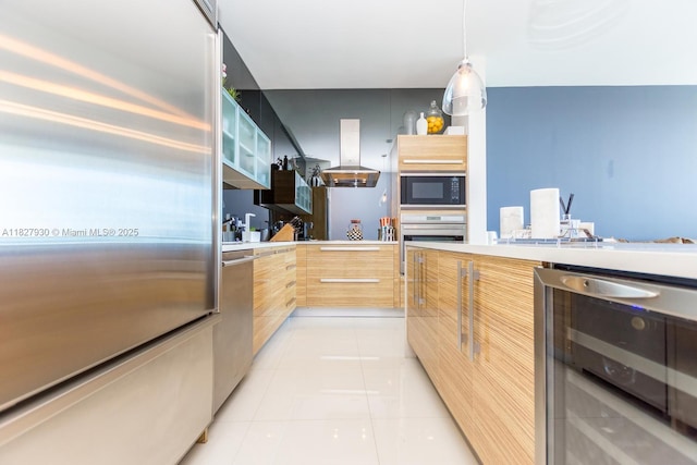 2020 N Bayshore Dr Unit 2005, Miami, FL 33137 - kitchen with beverage cooler, modern cabinets, stainless steel appliances, and island exhaust hood