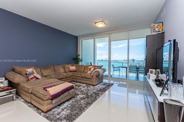 2020 N Bayshore Dr Unit 2005, Miami, FL 33137 - tiled living area featuring a wall of windows