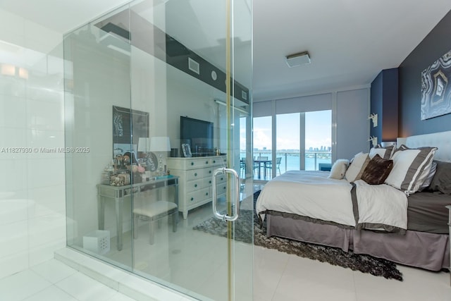 2020 N Bayshore Dr Unit 2005, Miami, FL 33137 - bedroom with tile patterned flooring, access to exterior, and a wall of windows