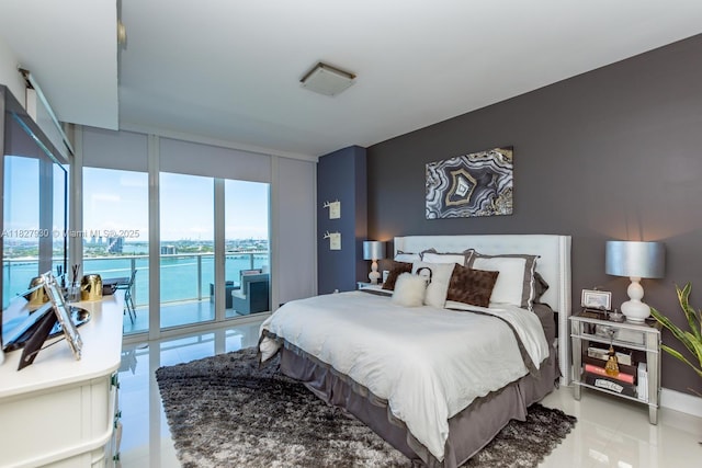 2020 N Bayshore Dr Unit 2005, Miami, FL 33137 - bedroom with access to outside, light tile patterned floors, a water view, and floor to ceiling windows