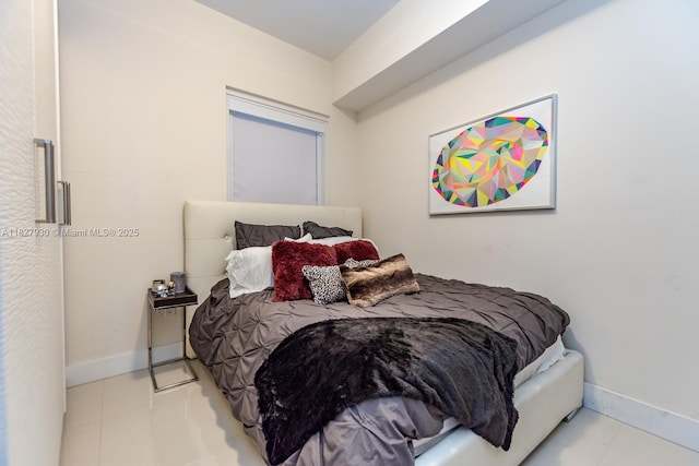 2020 N Bayshore Dr Unit 2005, Miami, FL 33137 - tiled bedroom featuring baseboards