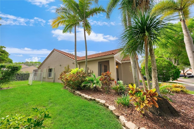 4361 Mahogany Ridge Dr, Weston, FL 33331 - view of side of property with a tiled roof and stucco siding
