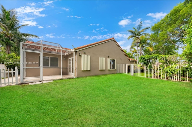 4361 Mahogany Ridge Dr, Weston, FL 33331 - rear view of house with stucco siding, a tiled roof, and a patio