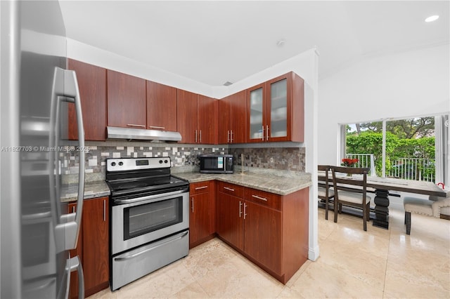 4361 Mahogany Ridge Dr, Weston, FL 33331 - kitchen with appliances with stainless steel finishes, under cabinet range hood, backsplash, light stone counters, and glass insert cabinets