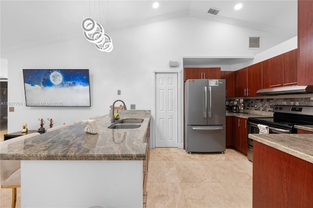 4361 Mahogany Ridge Dr, Weston, FL 33331 - kitchen with appliances with stainless steel finishes, under cabinet range hood, a breakfast bar, a peninsula, and dark stone counters