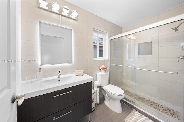 4361 Mahogany Ridge Dr, Weston, FL 33331 - full bathroom featuring vanity, a stall shower, and tile walls