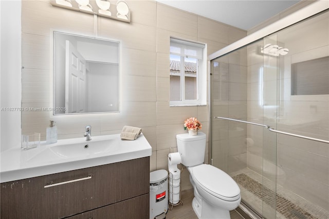 4361 Mahogany Ridge Dr, Weston, FL 33331 - bathroom featuring vanity, tile walls, and a stall shower