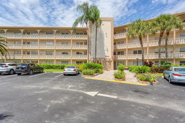 2303 Lucaya Ln Unit G2, Coconut Creek, FL 33066 - view of apartment building / complex featuring uncovered parking