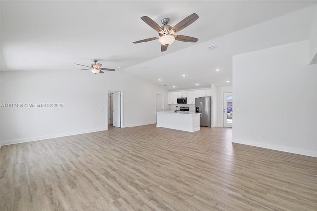 1119 NW 19th St, Cape Coral, FL 33993 - unfurnished living room featuring light wood-style flooring, ceiling fan, lofted ceiling, and recessed lighting