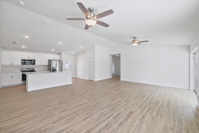 1119 NW 19th St, Cape Coral, FL 33993 - unfurnished living room featuring vaulted ceiling, light wood-style floors, ceiling fan, and recessed lighting