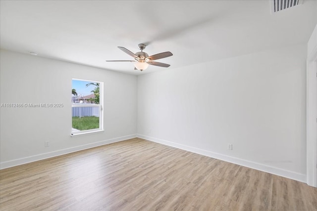 1119 NW 19th St, Cape Coral, FL 33993 - spare room with light wood finished floors and a ceiling fan