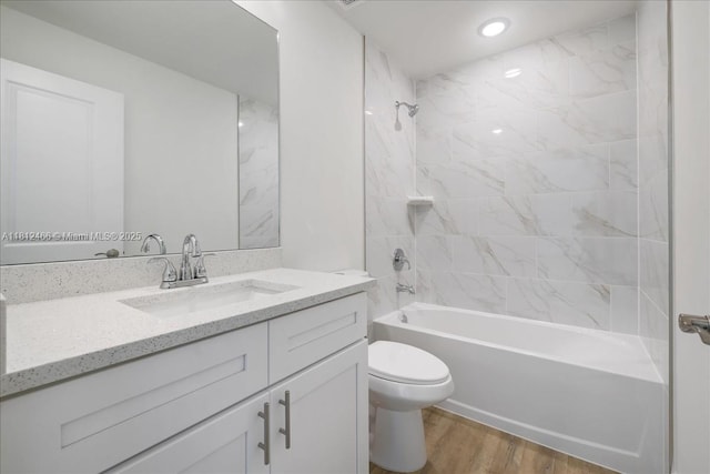 1119 NW 19th St, Cape Coral, FL 33993 - bathroom with vanity,  shower combination, and wood finished floors